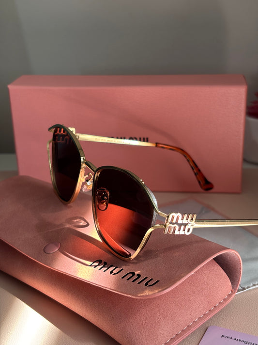 Gafas miu miu color café