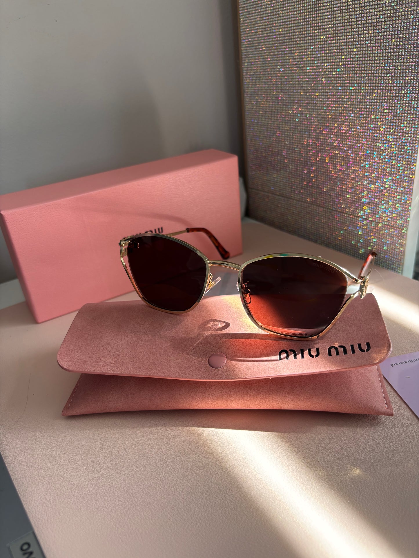 Gafas miu miu color café