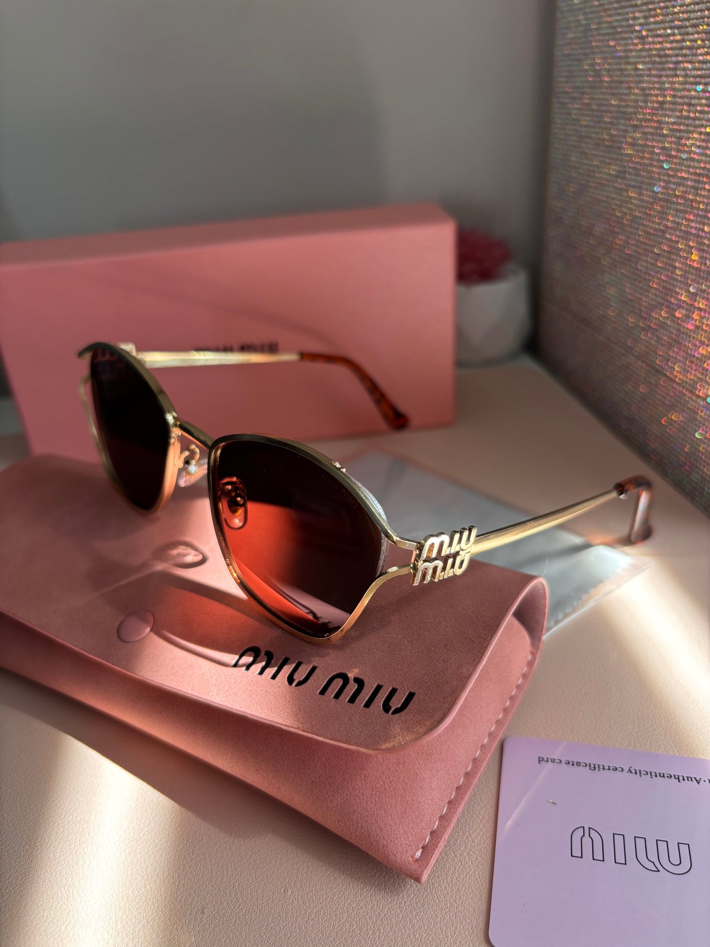 Gafas miu miu color café