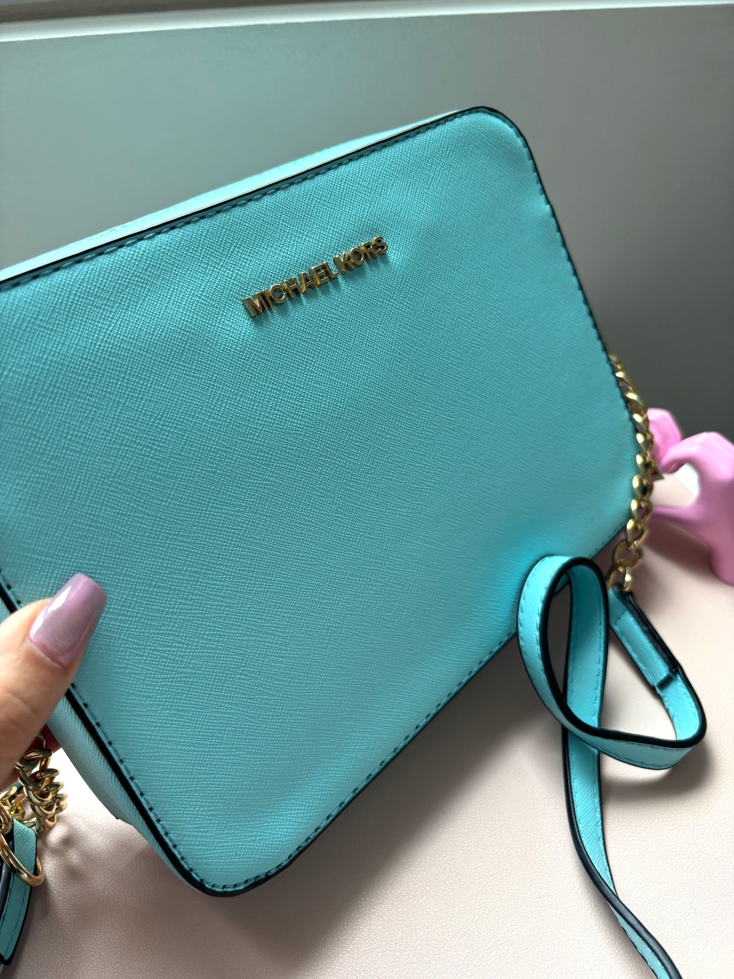 Bandolera MK celeste bebe